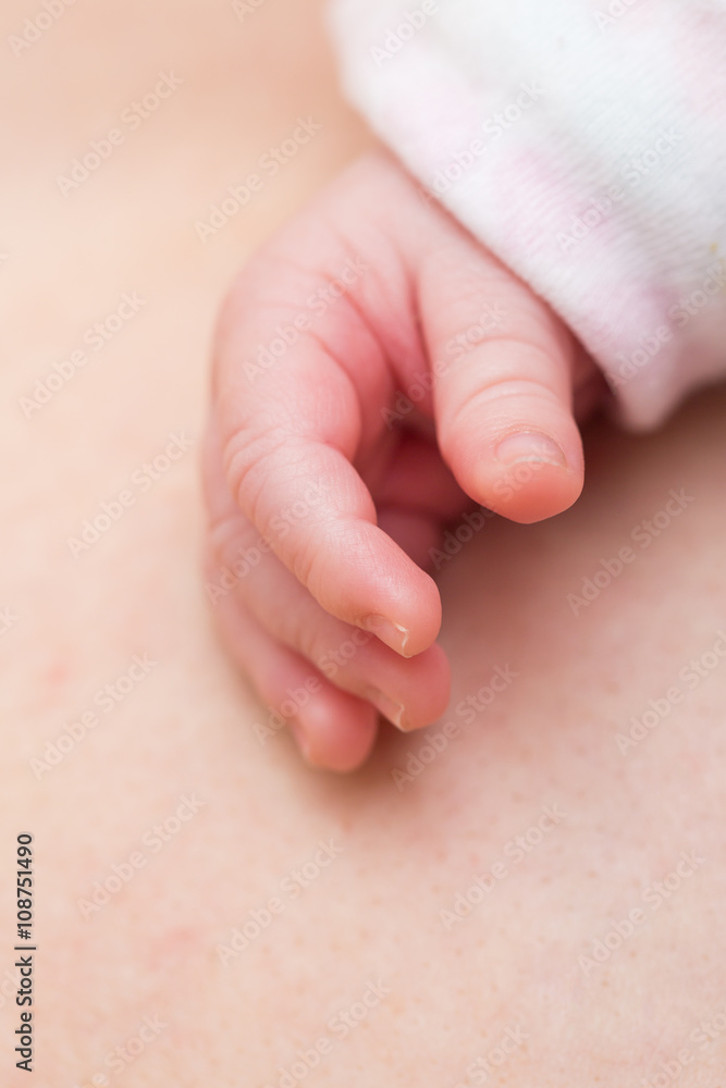 Newborn baby's hand with tiny fingers Newborn baby's hand with tiny fingers