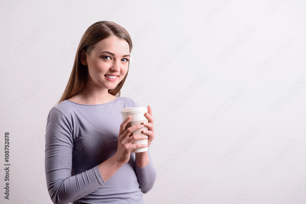 Nice girl drinking coffee. Nice girl drinking coffee.