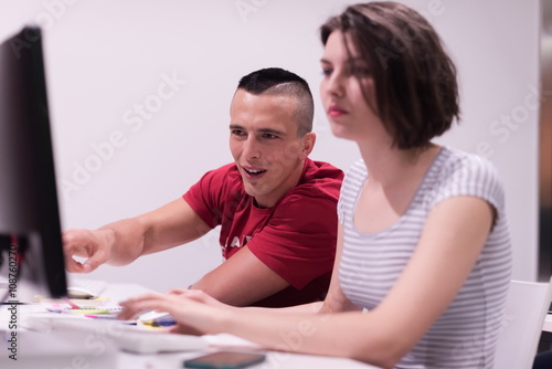 technology students group working in computer lab school class