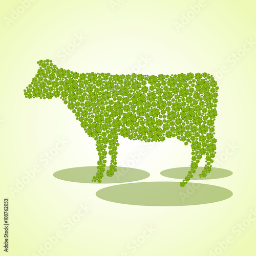 Silhouette of a cow from the leaves of different sizes clover