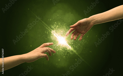 Touching arms lighting spark at fingertip