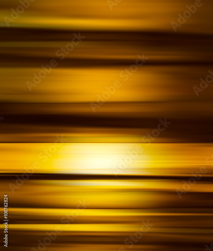 Vertical golden motion blur abstraction backdrop