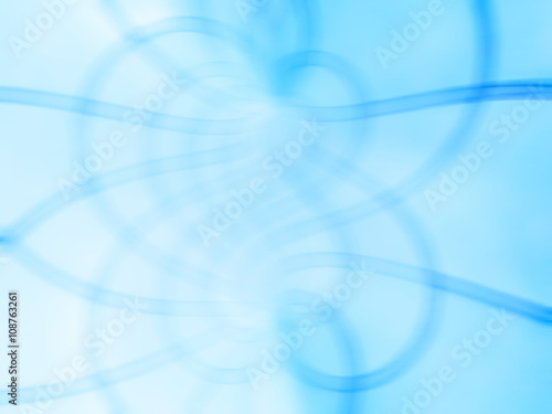 Horizontal vivid cyan rope worm blurred abstraction backdrop