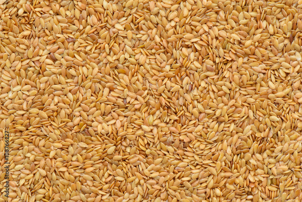 Golden linseed texture or background Golden linseed texture or background