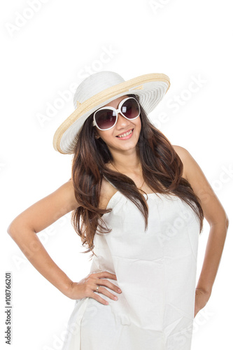 young attractive woman in white dress wearing summer hat and sun © Odua Images