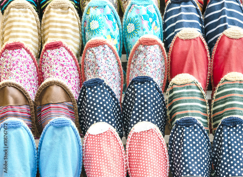 Colorful textile fabric slippers background