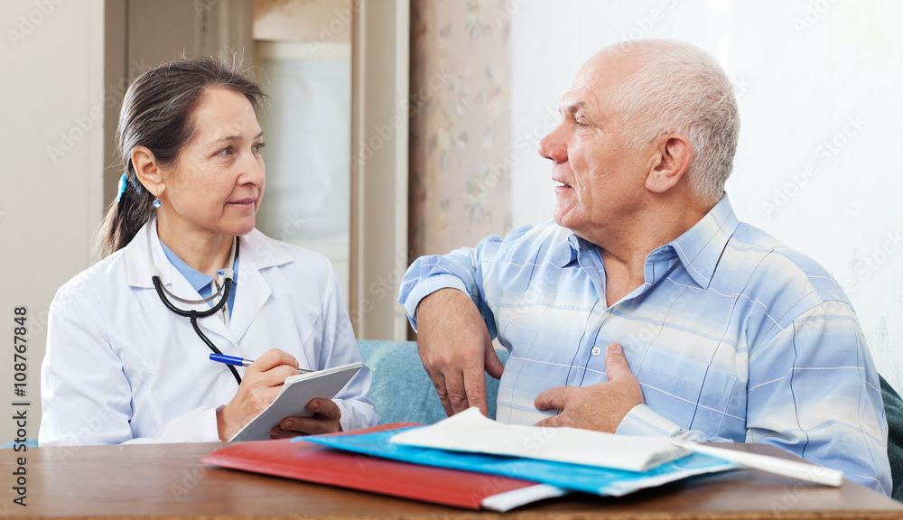 Fototapeta premium Senior man complaining to doctor