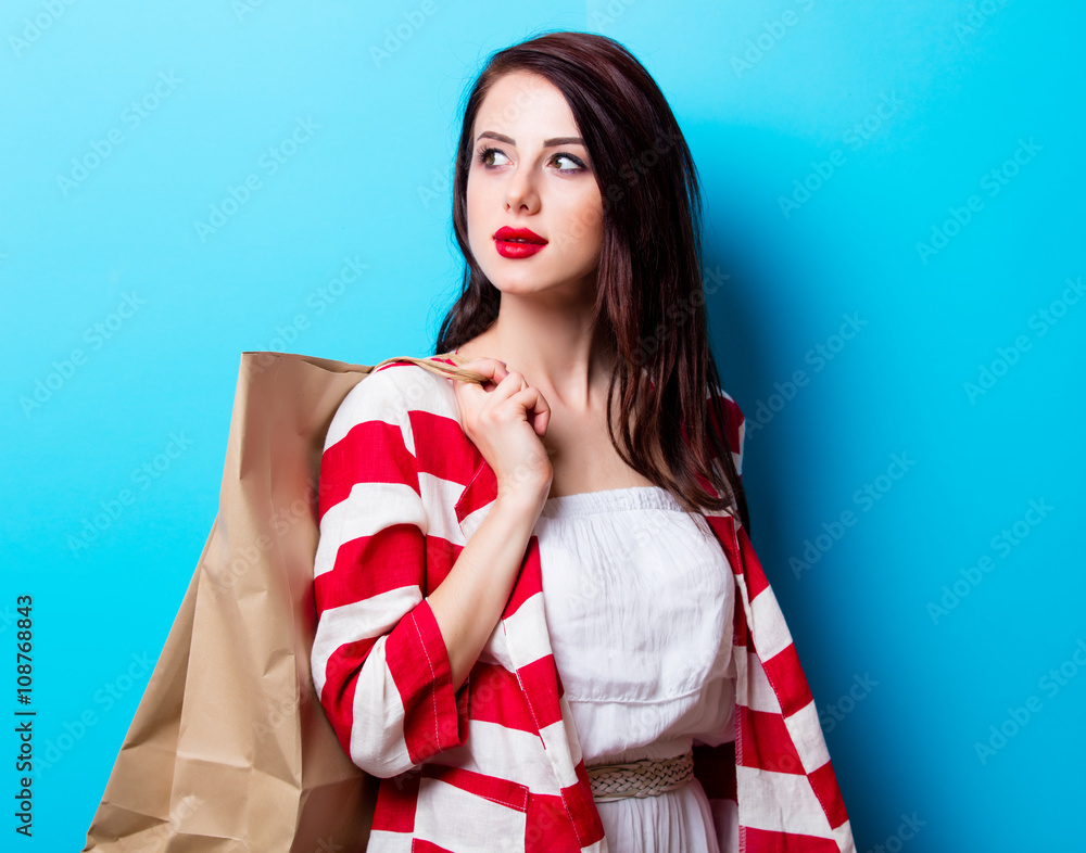 portrait of the young woman with shopping bags portrait of the young woman with shopping bags