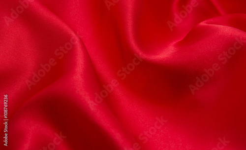 red satin or silk fabric as background