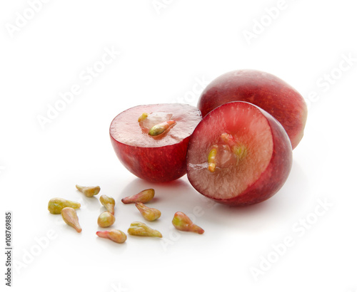 Photographie Grapes with seeds isolated on white background with clipping path