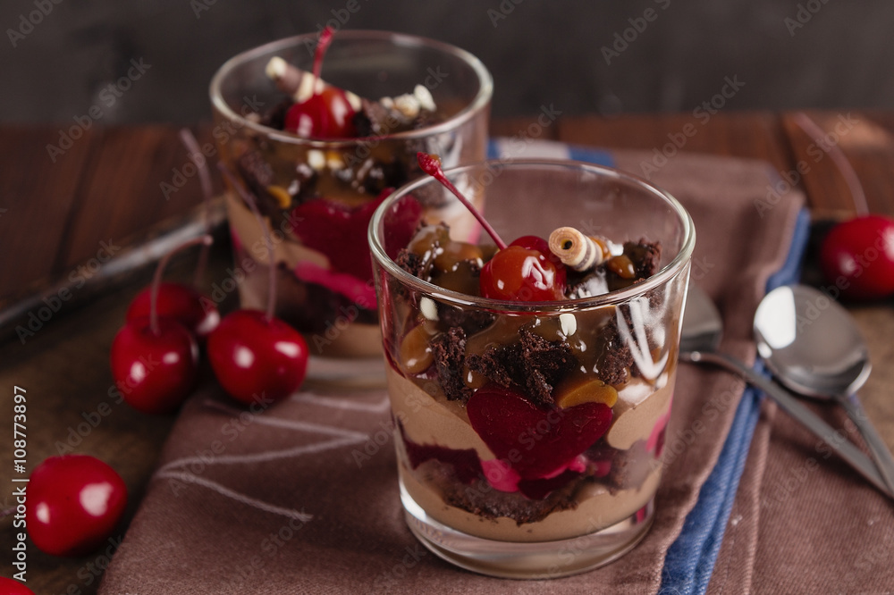 Chocolate and cherry dessert in glass Chocolate and cherry dessert in glass