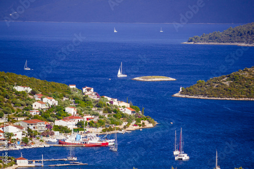 Blue sailing bay in Vinisce photo