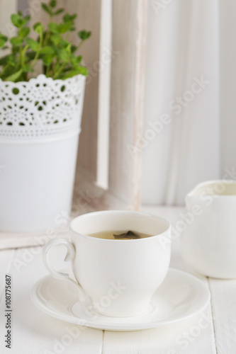 Fototapeta Naklejka Na Ścianę i Meble -  Cup of tea on white background