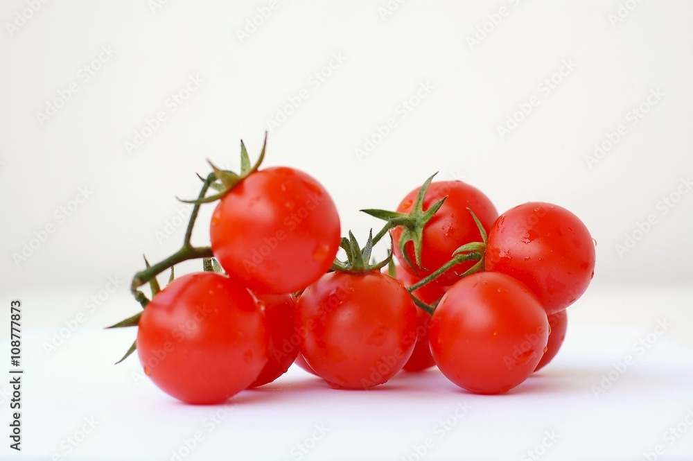 Tomatoes on the white background Tomatoes on the white background