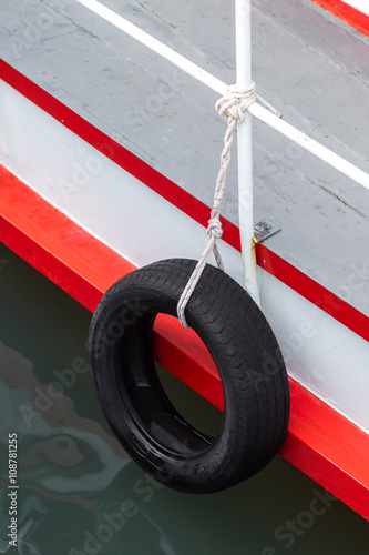 Tires used on pier or warf to protect commercial boats when tied