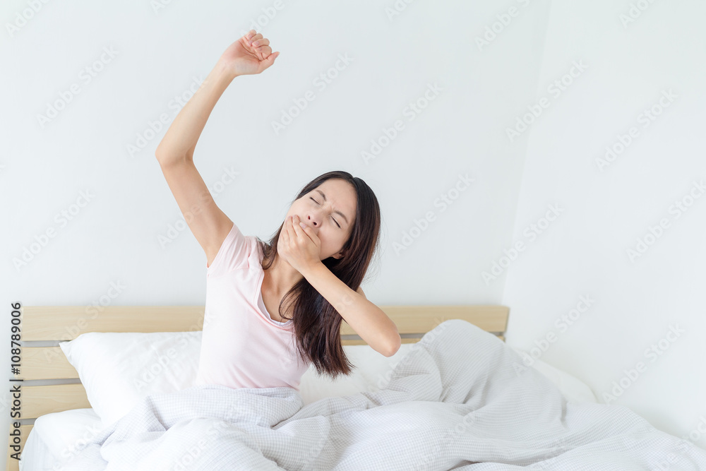 Woman stretching in the morning Woman stretching in the morning