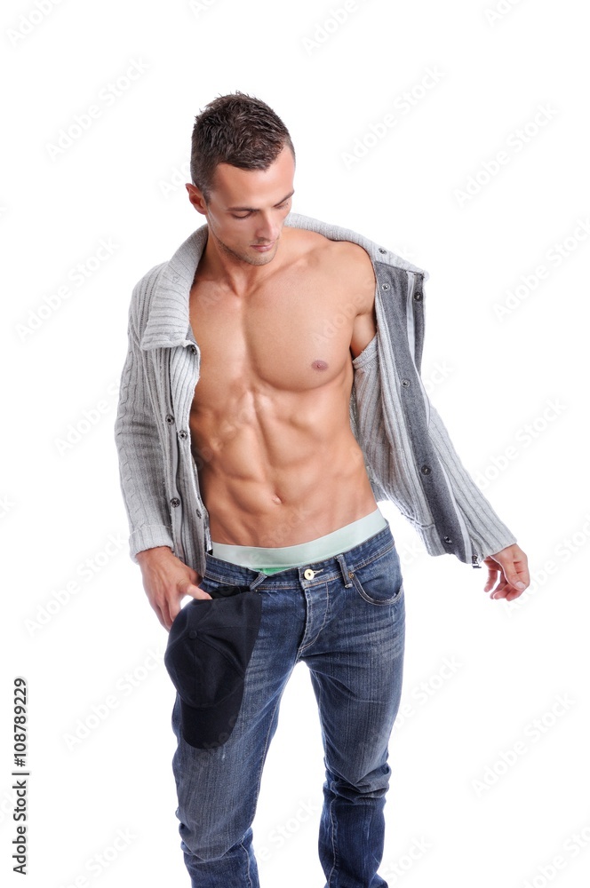 Portrait of Powerful Muscular Man Posing on a White Background Portrait of Powerful Muscular Man Posing on a White Background