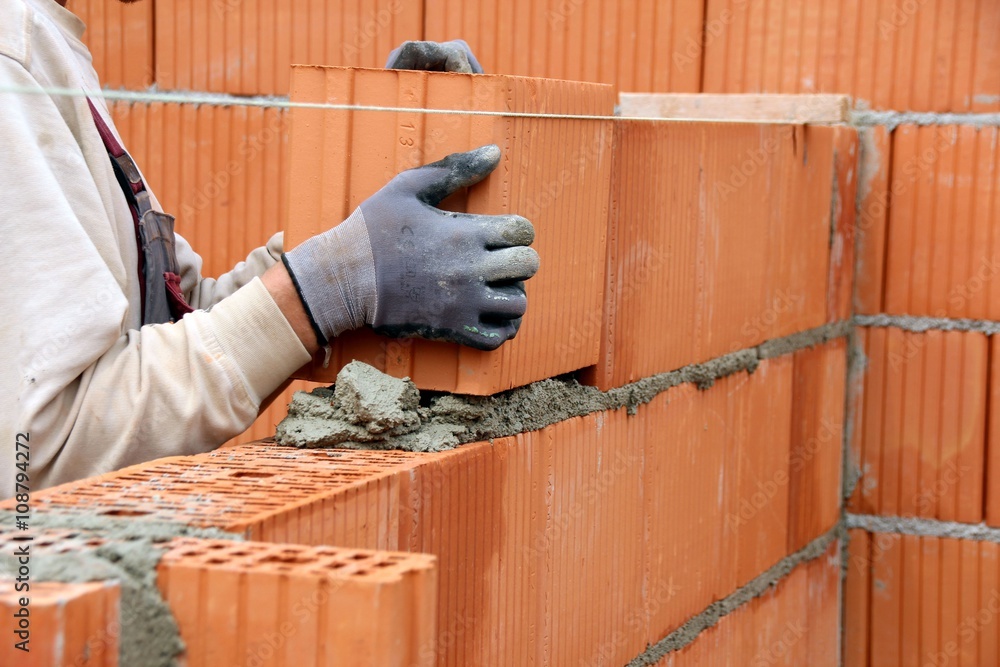 maurer bei der arbeit StockFoto Adobe Stock