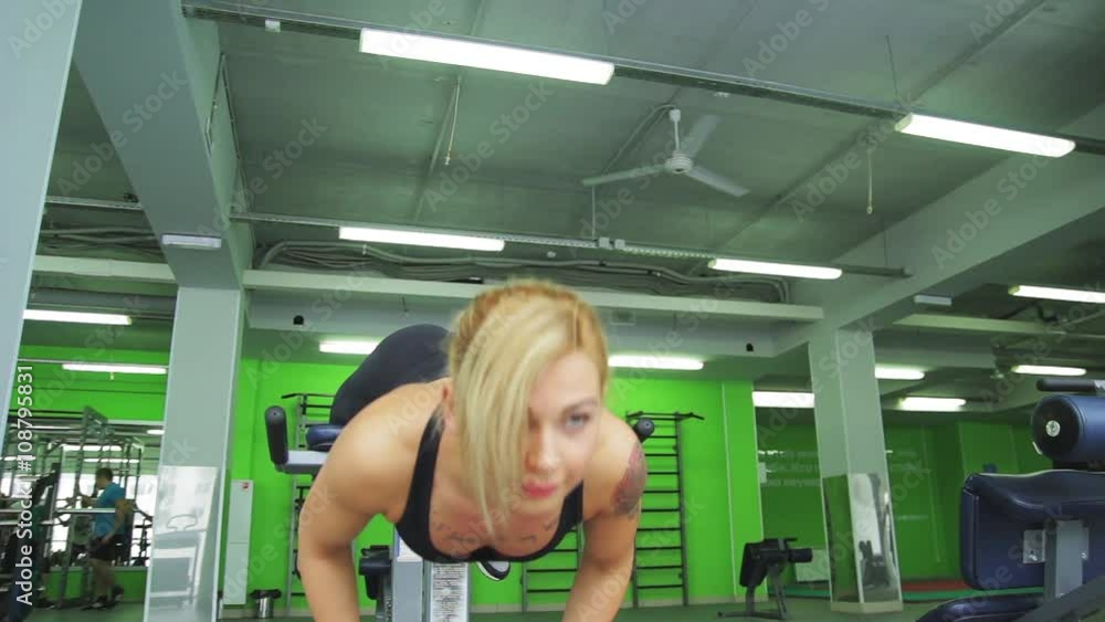 girl goes in for sports, fitness in the gym at the gym girl goes in for sports, fitness in the gym at the gym