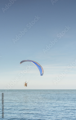 Paramotor on the sky in the evening:Close up,select focus with s