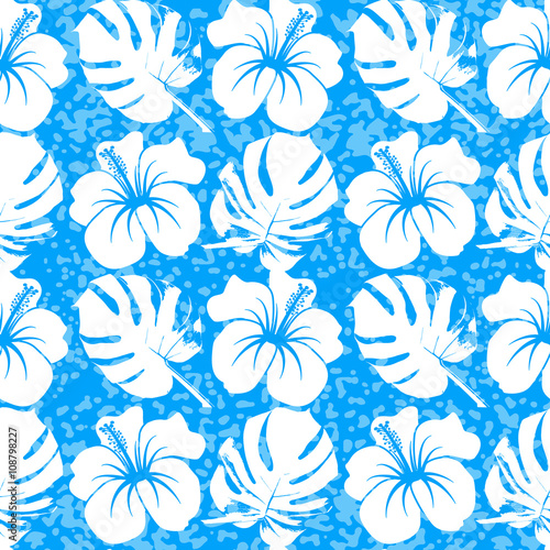 Vector seamless pattern with silhouette of tropical leafs 