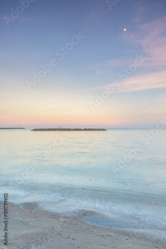 Long exposure dramatic tropical sea and sky sunset Un-focus imag