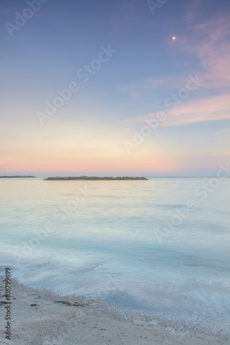 Fototapeta Naklejka Na Ścianę i Meble -  Long exposure dramatic tropical sea and sky sunset(Un-focus imag