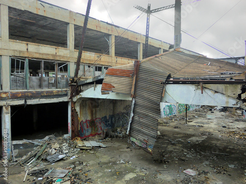 Abandoned crumbling Detroit Michigan automotive factory warehouse - landscape color photo photo
