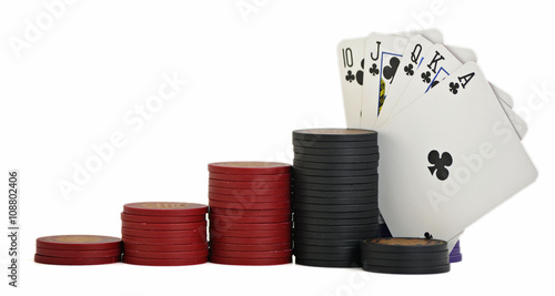 Tablou pe pânză Studio shot of royal flush suit with red, black and purple poker chips, stacked in ascending order, on white background