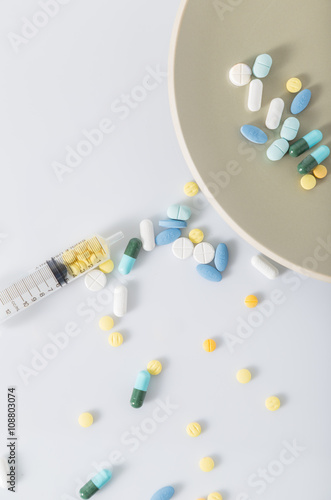 Tablets pills heap color mix therapy drugs doctor flu antibiotic