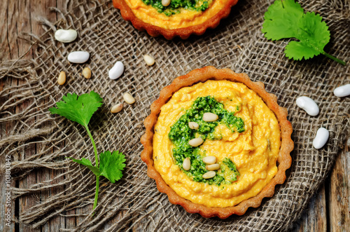 buckwheat tartlets with with white beans carrot hummus and cilan