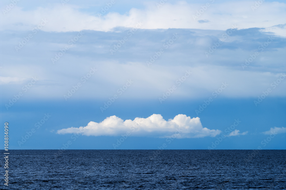White cumulus and altostratus cloud formation over the Baltic sea. Gdansk Bay, Pomerania, northern Poland. White cumulus and altostratus cloud formation over the Baltic sea. Gdansk Bay, Pomerania, northern Poland.
