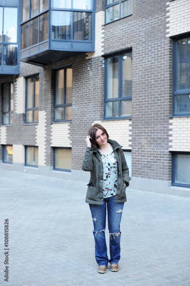 Portrait of a woman in urban background Portrait of a woman in urban background