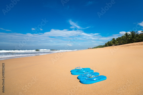 flip flops on a tropical beach