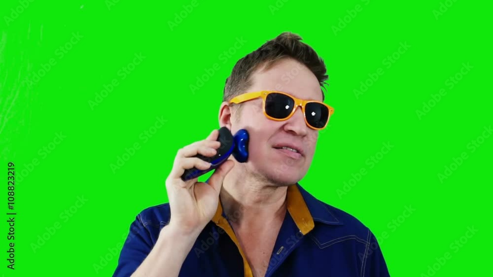 Man shaving, high quality green screen background. Man shaving, high quality green screen background.