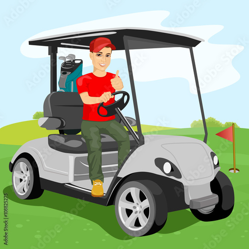 young golfer driving a golf-cart with clubs on the back on golf course 