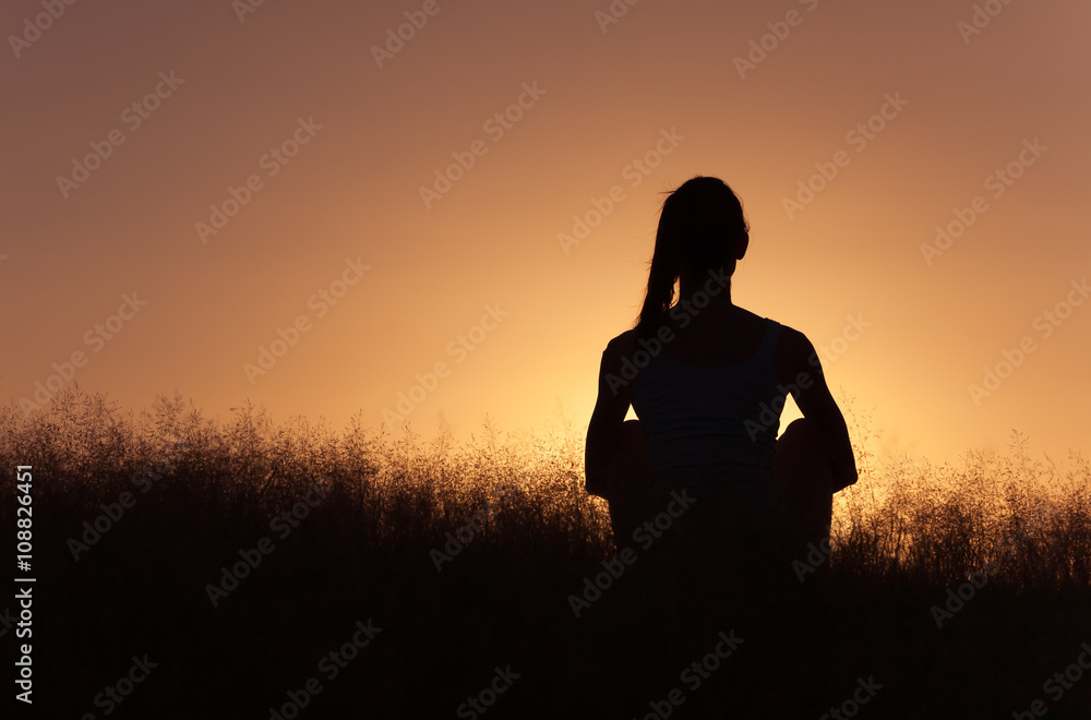 Young woman enjoying a peaceful moment. 