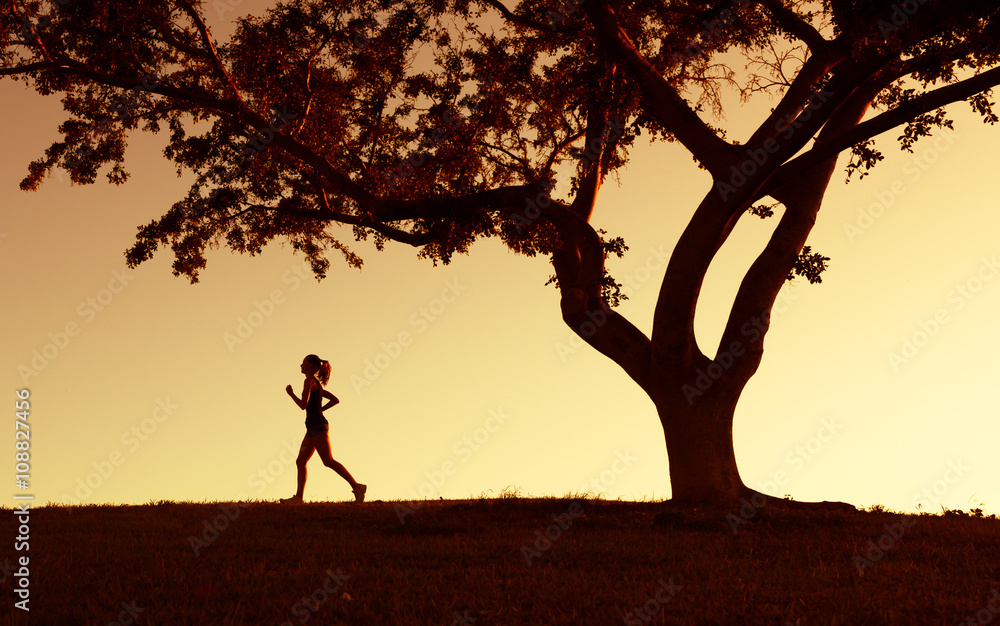 Female running outdoors. 