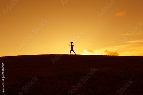 Silhouette of a girl running 