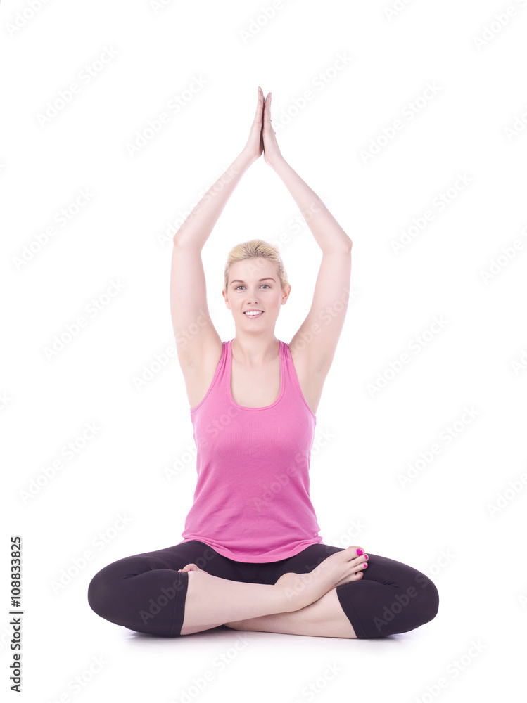 smiling woman doing yoga exercise