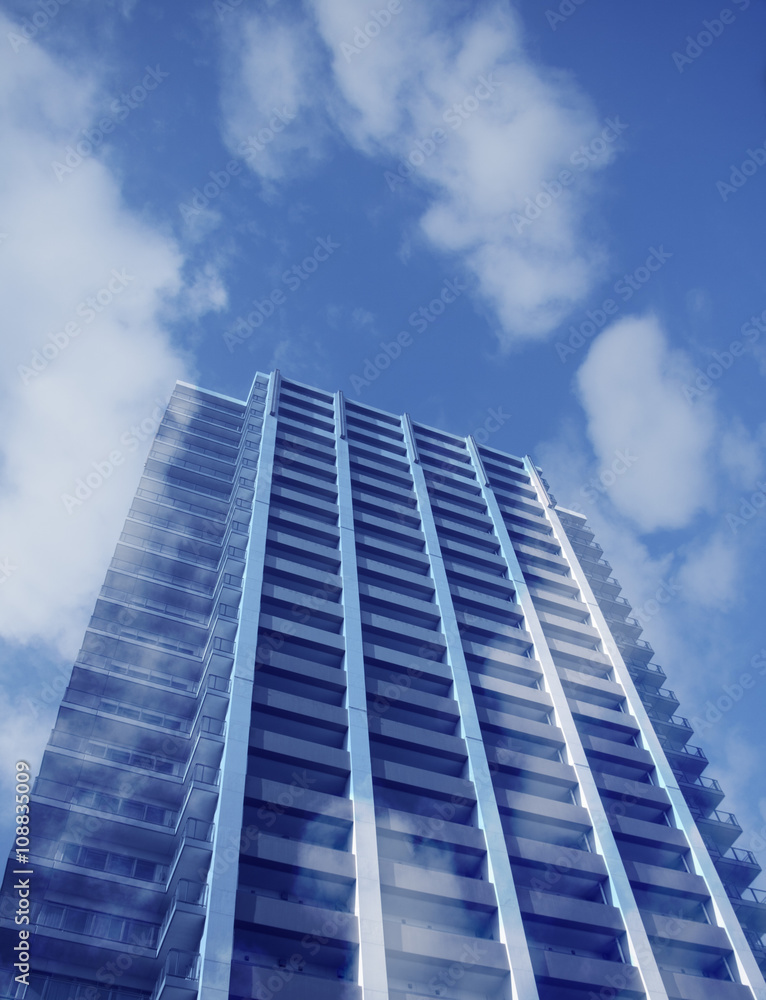 blue sky and high apartment house building