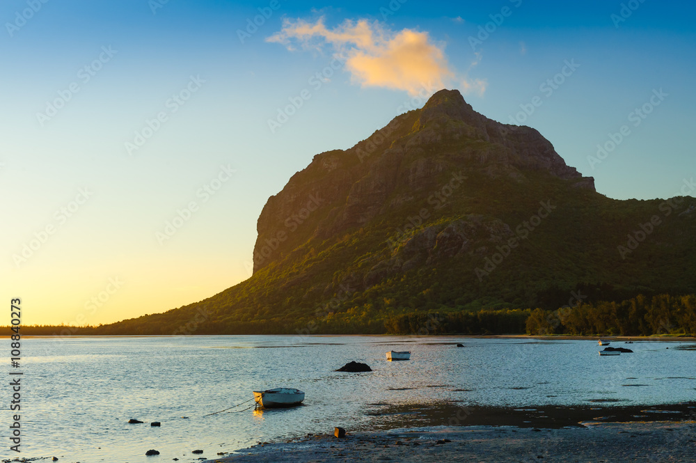 Magnificent views of Le Morne Brabant mountain at sunset. Mauritius Island