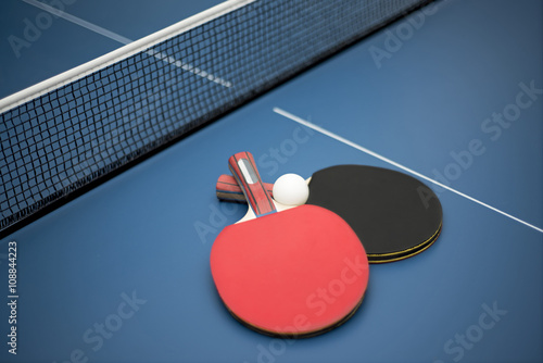 Table tennis ball and bat photo