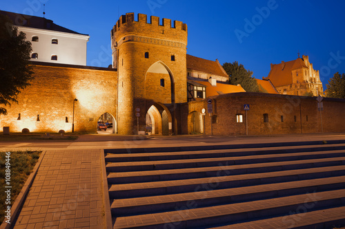 Gate and Wall to Old Town of Torun by Night