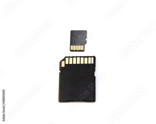 Micro SD card and adapter isolated on a white background