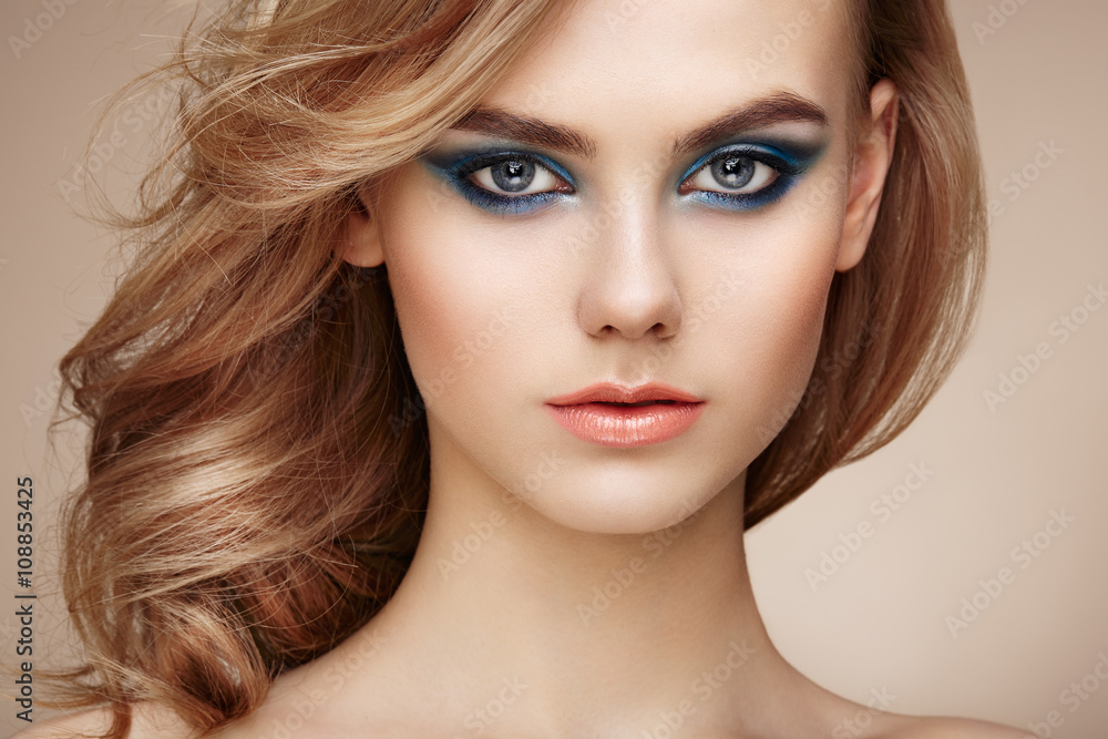 Portrait of beautiful sensual woman with elegant hairstyle. Perfect makeup. Beauty fashion. Eyelashes. Lips. Cosmetic Eyeshadow Portrait of beautiful sensual woman with elegant hairstyle. Perfect makeup. Beauty fashion. Eyelashes. Lips. Cosmetic Eyeshadow