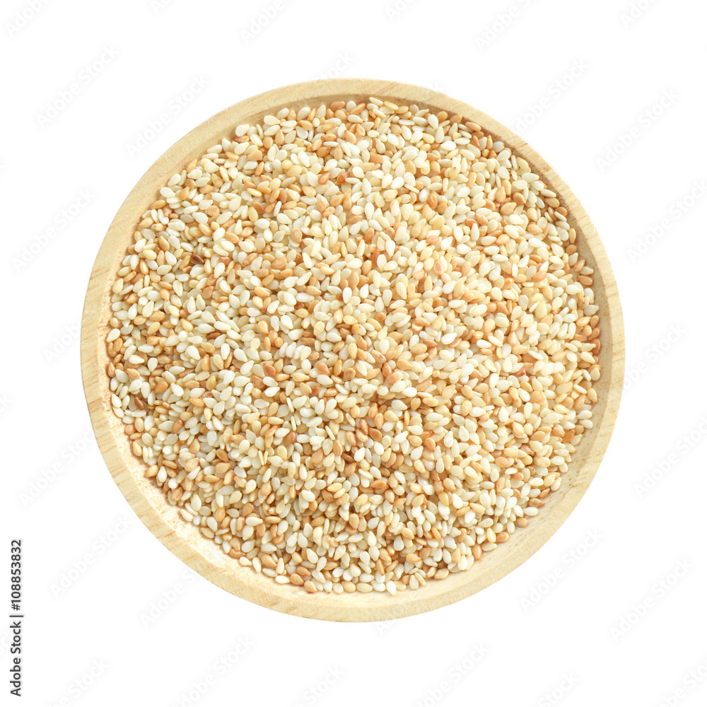 White sesame seed in wooden bowl isolated on white background White sesame seed in wooden bowl isolated on white background