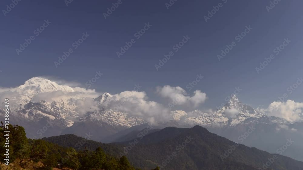 Time lapse of moving clouds at Himalaya. Annapurna I and Macchapucchre peaks seem from Australian camp at Annapurna ranges near Pokhara. Time lapse of moving clouds at Himalaya. Annapurna I and Macchapucchre peaks seem from Australian camp at Annapurna ranges near Pokhara.