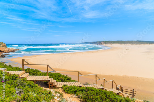 Wooden walkway to idyllic sandy Praia do Bordeira beach  Algarve region  Portugal