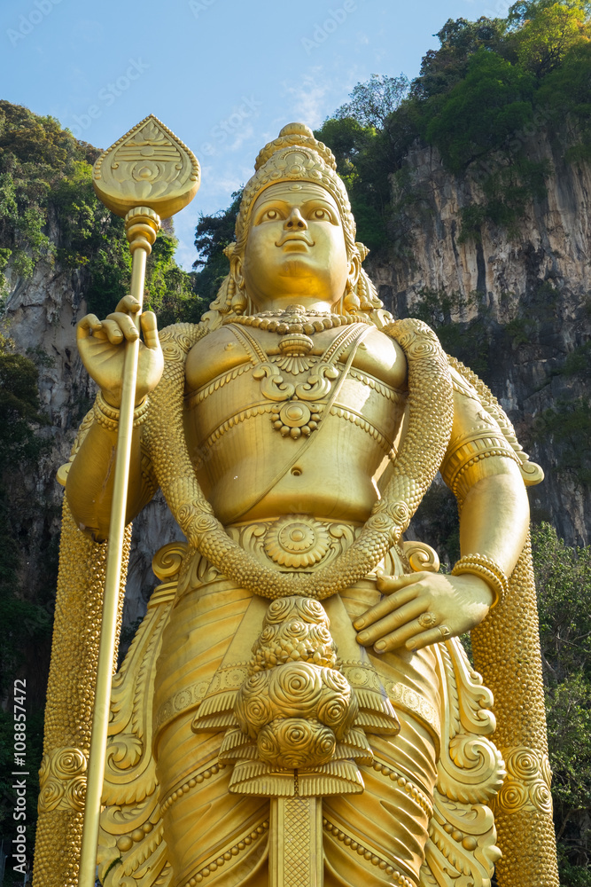 Statue of Murugan, a Hindu deity is located at entrance of Batu